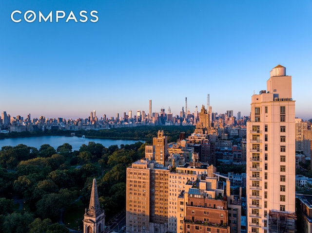 property's view of city with a water view