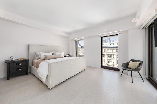 bedroom with light wood-style flooring