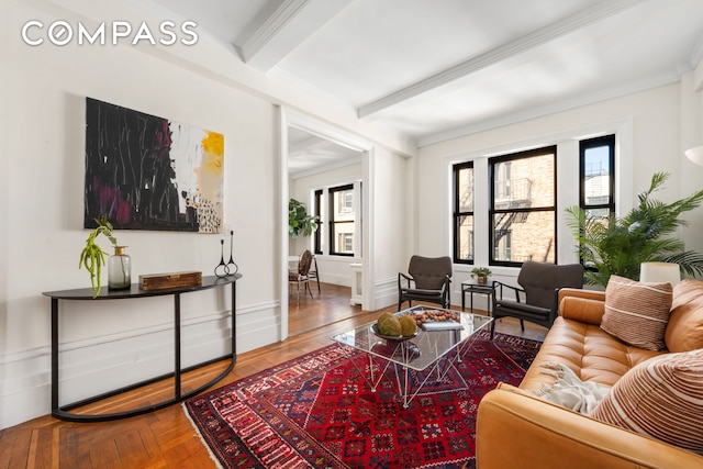 living room with crown molding, parquet floors, beamed ceiling, and baseboards