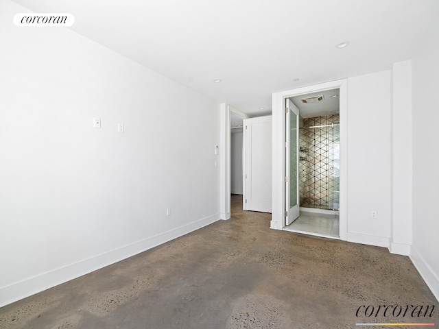 unfurnished bedroom featuring finished concrete flooring, baseboards, visible vents, and recessed lighting