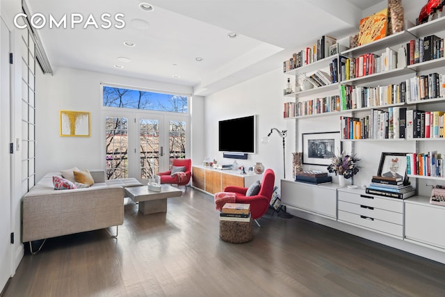 living area with french doors, dark wood finished floors, and recessed lighting