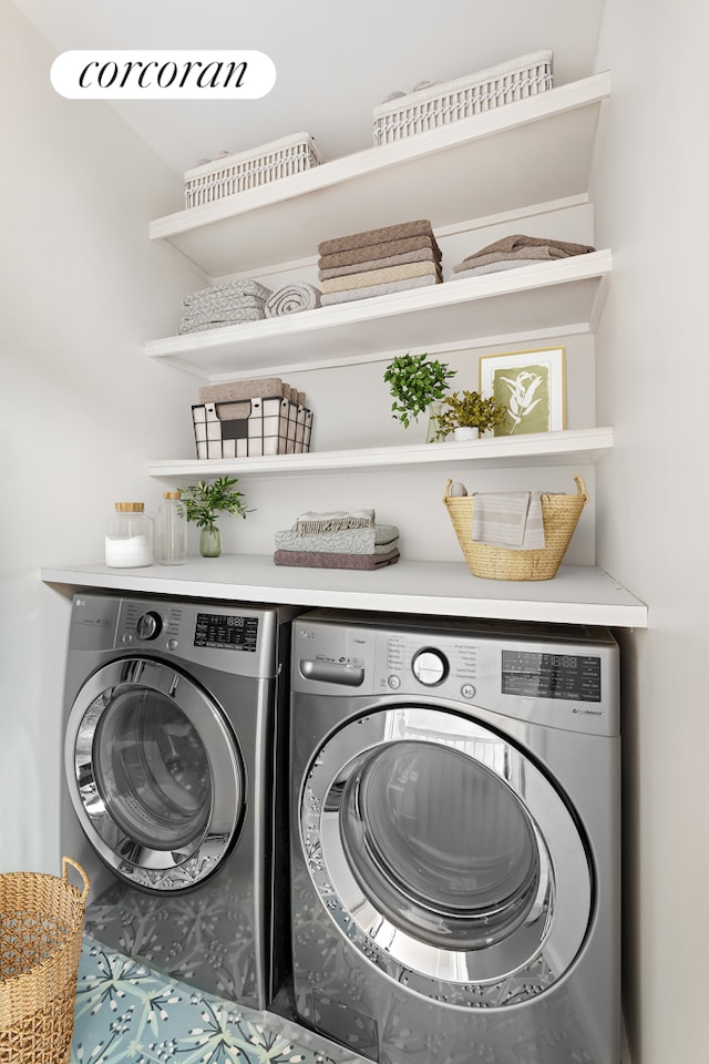 laundry area featuring laundry area and independent washer and dryer