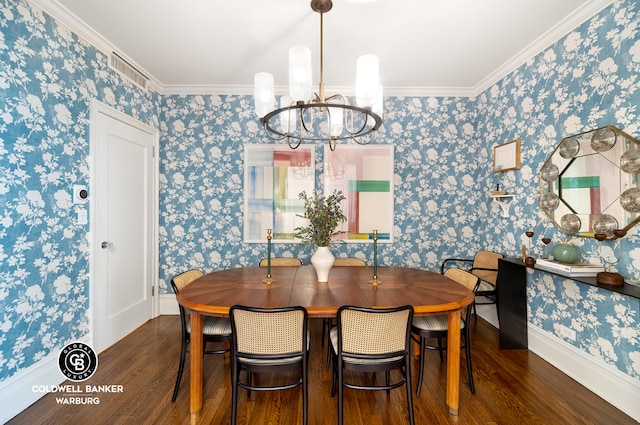 dining room with ornamental molding, wood finished floors, visible vents, and wallpapered walls