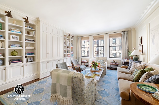 interior space featuring crown molding and wood finished floors