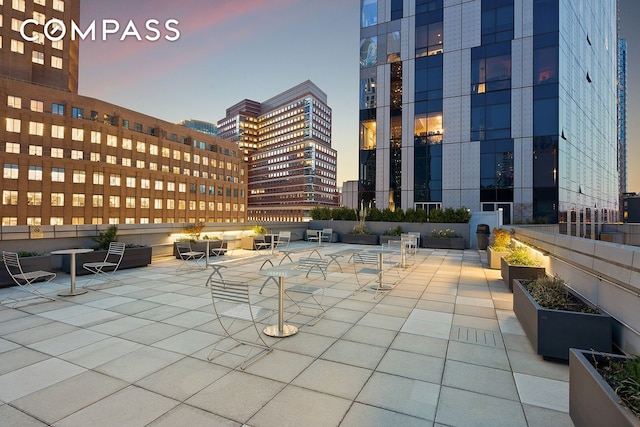 view of patio featuring a view of city