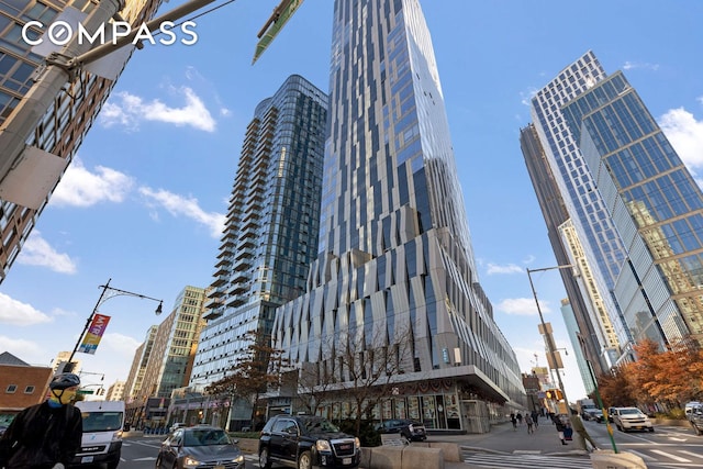 view of building exterior featuring a city view