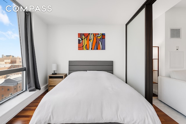 150 Myrtle Ave Unit 602, New York City, NY 11201 - bedroom with dark wood-style flooring