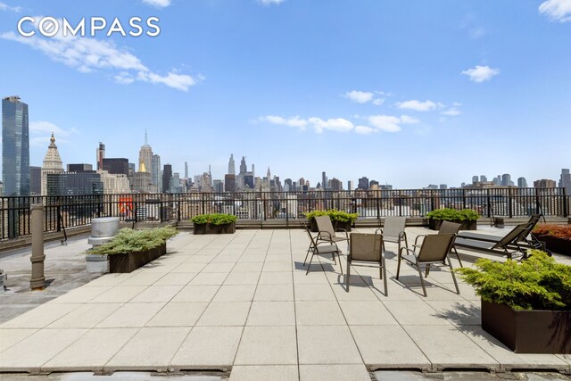 view of patio with a city view