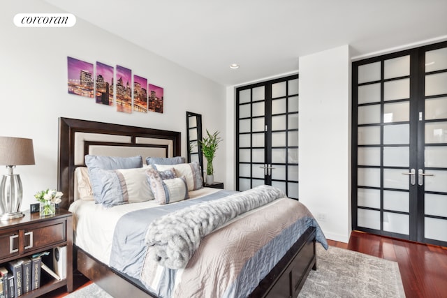 bedroom featuring recessed lighting, french doors, visible vents, and wood finished floors