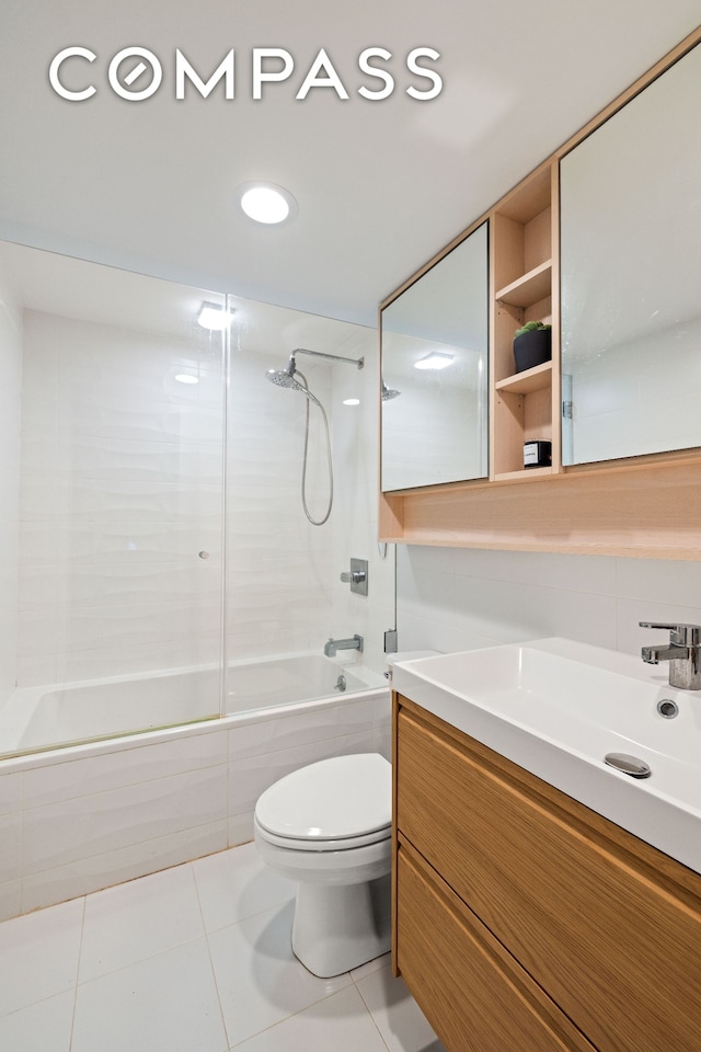 full bathroom with vanity, shower / bathing tub combination, tile patterned flooring, and toilet