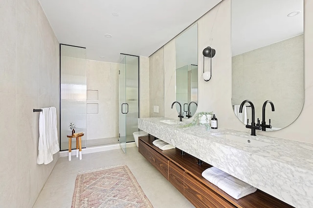 96 Coffey St, New York City, NY 11231 - bathroom featuring a shower stall, double vanity, and tile patterned flooring