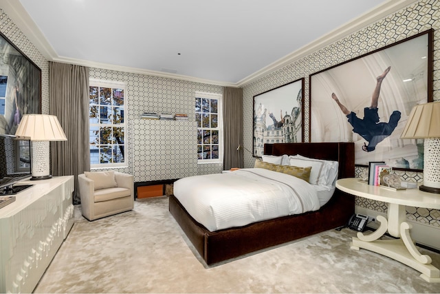 carpeted bedroom with ornamental molding
