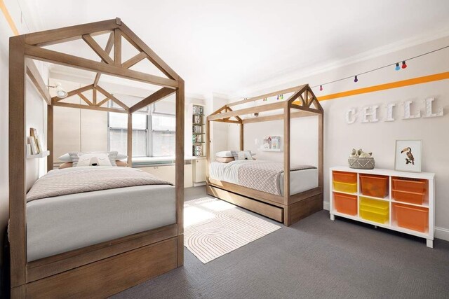 10 W 15th St Unit 1027/1028, New York City, NY 10011 - carpeted bedroom with baseboards