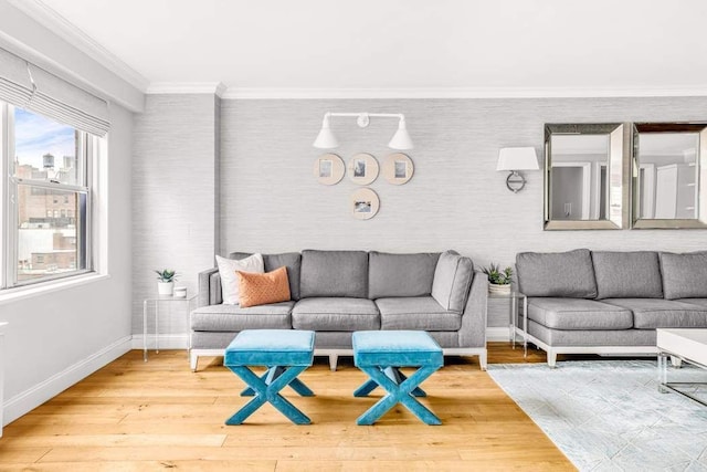 10 W 15th St Unit 1027/1028, New York City, NY 10011 - living area featuring baseboards, wood finished floors, ornamental molding, and wallpapered walls