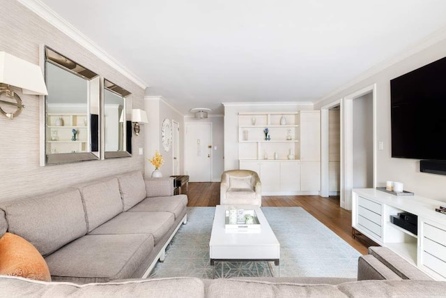 10 W 15th St Unit 1027/1028, New York City, NY 10011 - living room with crown molding, wood finished floors, and built in shelves