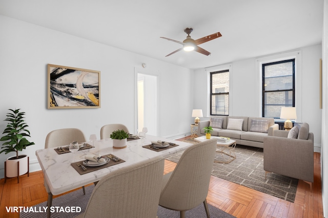 dining area featuring ceiling fan