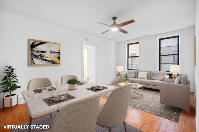 dining room featuring a ceiling fan