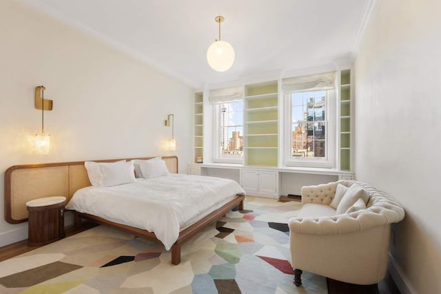bedroom with ornamental molding