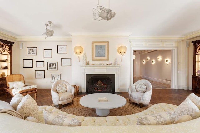 living room with crown molding, baseboards, and a lit fireplace