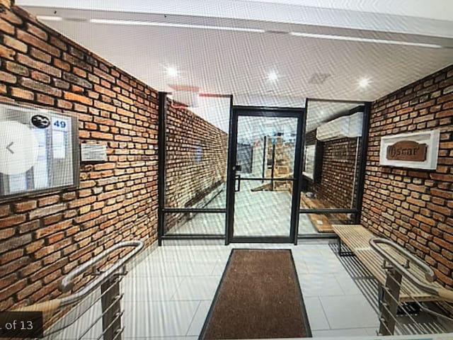 interior space with brick wall