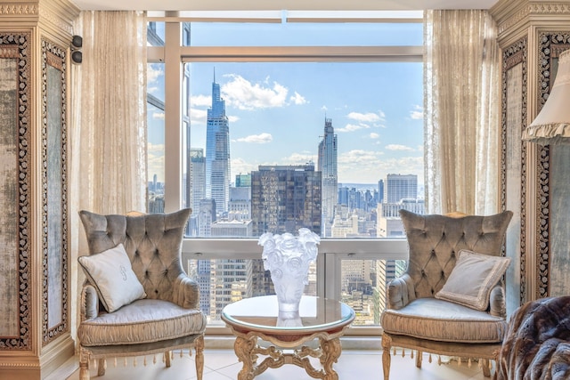 living area featuring a city view and tile patterned floors