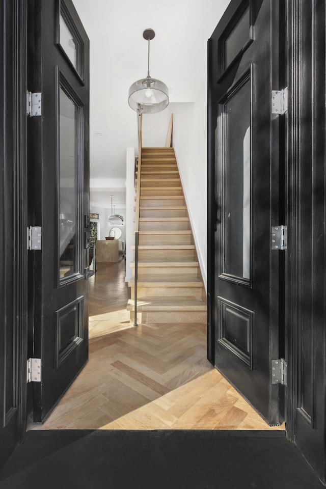 foyer entrance featuring stairs