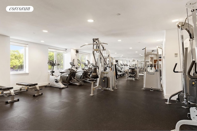 exercise room featuring recessed lighting, baseboards, and visible vents