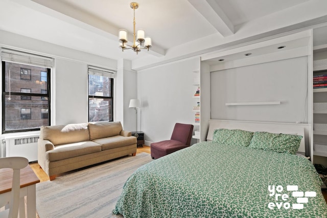 bedroom featuring radiator, a notable chandelier, beam ceiling, and wood finished floors