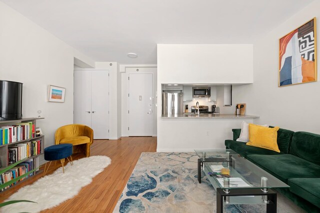 5 W 127th St Unit 2-A, New York City, NY 10027 - living area with wood finished floors and baseboards