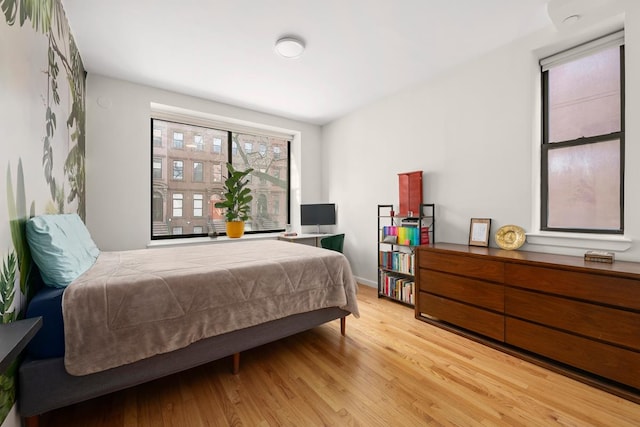 5 W 127th St Unit 2-A, New York City, NY 10027 - bedroom featuring light wood finished floors and baseboards