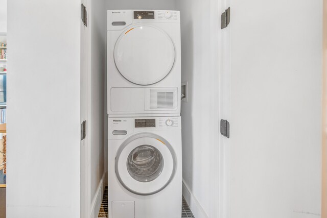 1702 Newkirk Ave Unit 5A, New York City, NY 11226 - laundry room featuring stacked washer / drying machine and baseboards