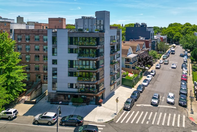 1702 Newkirk Ave Unit 5A, New York City, NY 11226 - view of building exterior with uncovered parking