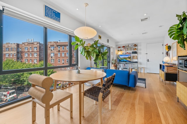 1702 Newkirk Ave Unit 5A, New York City, NY 11226 - dining area featuring light wood finished floors and recessed lighting