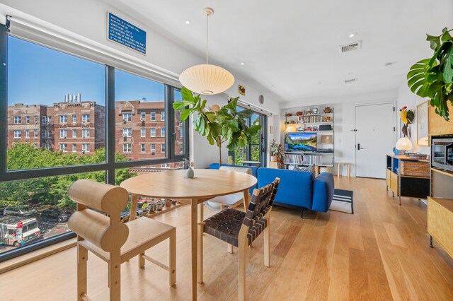 1702 Newkirk Ave Unit 5A, New York City, NY 11226 - dining area with light wood finished floors and recessed lighting