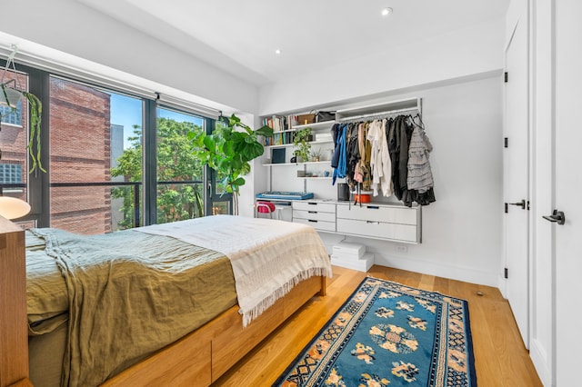 1702 Newkirk Ave Unit 5A, New York City, NY 11226 - bedroom with light wood-style flooring, baseboards, and recessed lighting