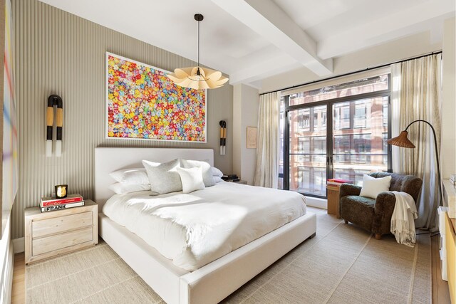 bedroom featuring beam ceiling