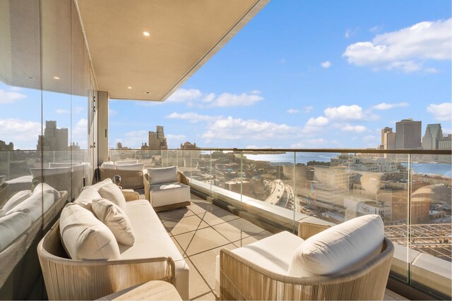 30 Front St Unit 21A/D, New York City, NY 11201 - balcony with an outdoor living space, a water view, and a city view