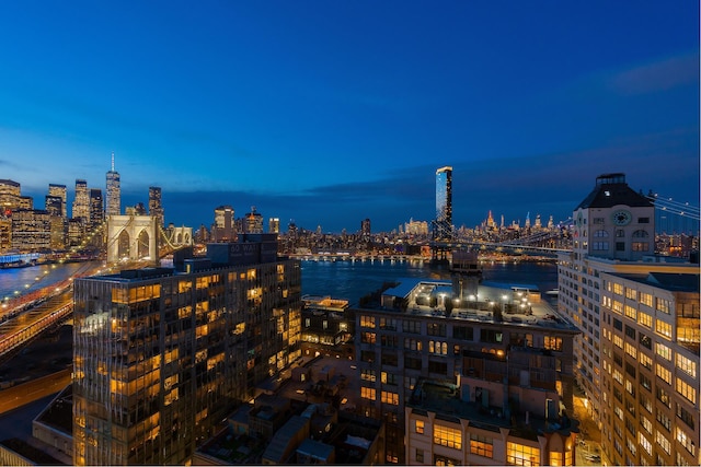 property's view of city with a water view