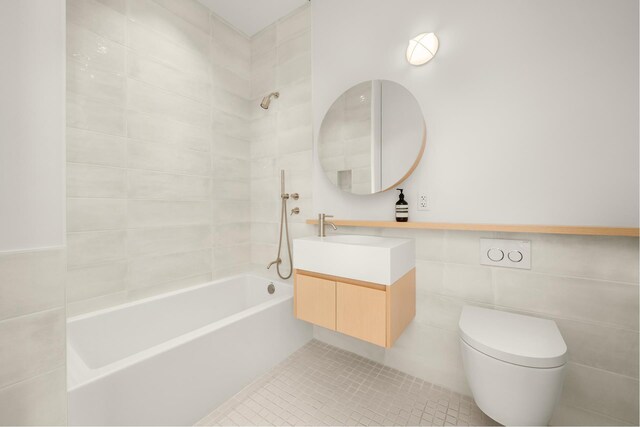 30 Front St Unit 21A/D, New York City, NY 11201 - bathroom with toilet, vanity, tile patterned flooring, and tub / shower combination