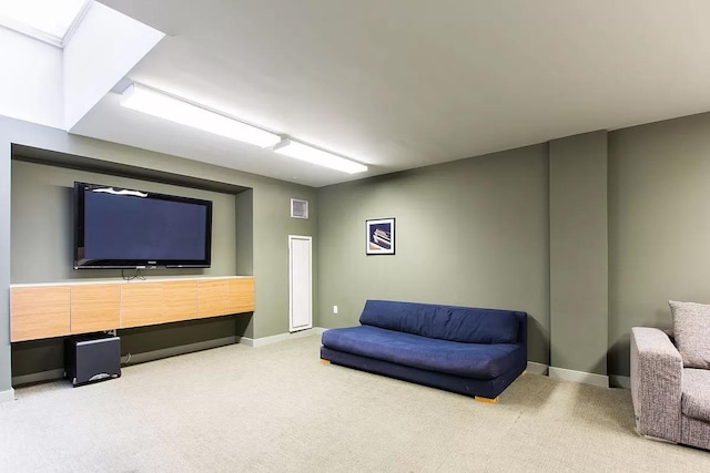 living room featuring light carpet, visible vents, and baseboards