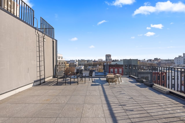 view of patio / terrace featuring a city view