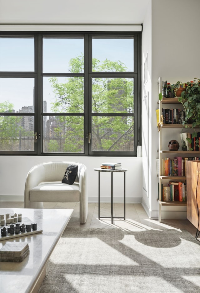 sitting room with tile patterned flooring