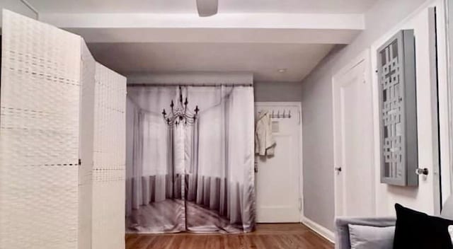 mudroom with ceiling fan and wood finished floors