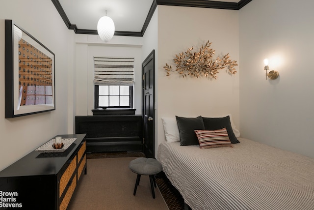 bedroom with ornamental molding