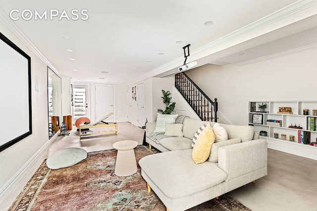 living room with stairs, baseboards, and ornamental molding