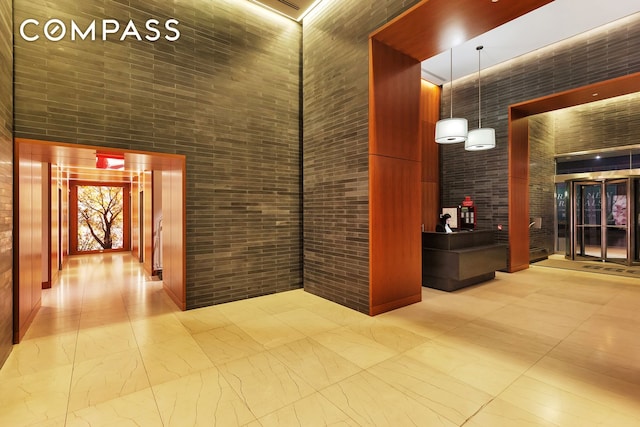 388 Bridge St Unit Ph50D, New York City, NY 11201 - building lobby featuring a towering ceiling