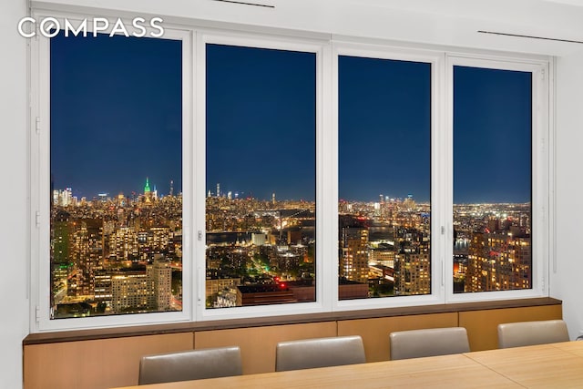 388 Bridge St Unit Ph50D, New York City, NY 11201 - dining area with a view of city lights