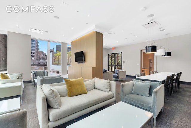 388 Bridge St Unit Ph50D, New York City, NY 11201 - living room featuring baseboards and recessed lighting