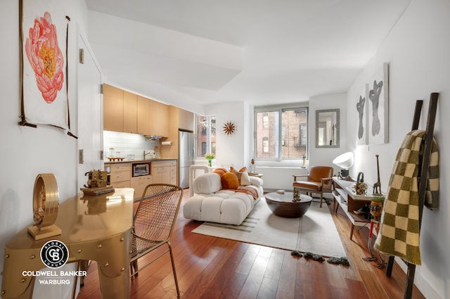 living area featuring hardwood / wood-style floors