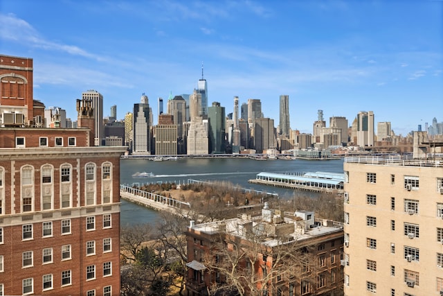 property's view of city featuring a water view